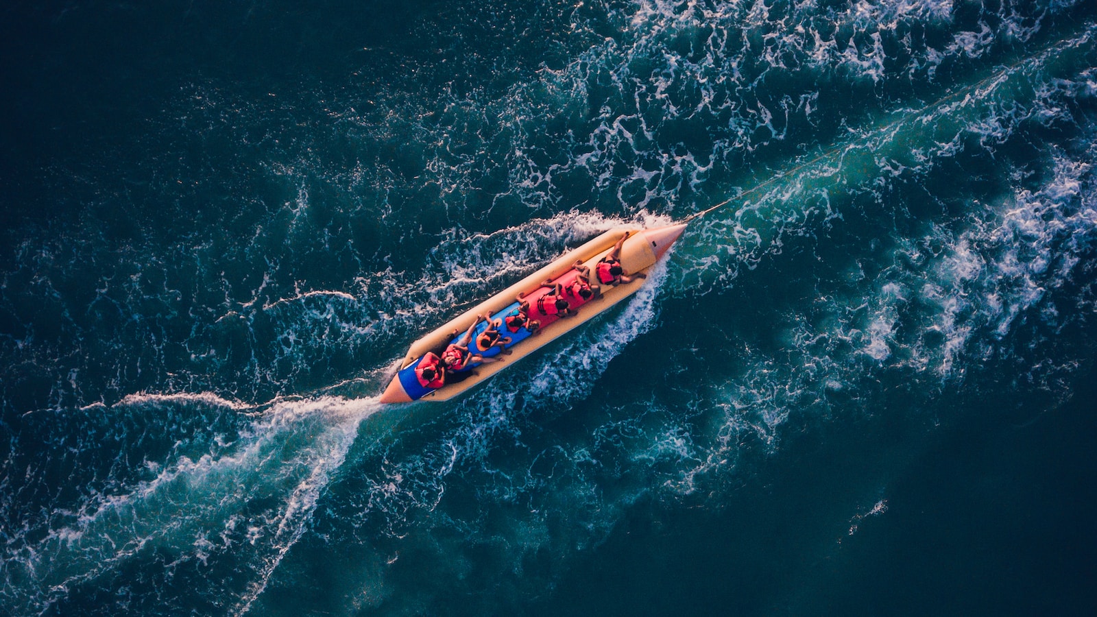 bird's eye view photography of boat on body of water